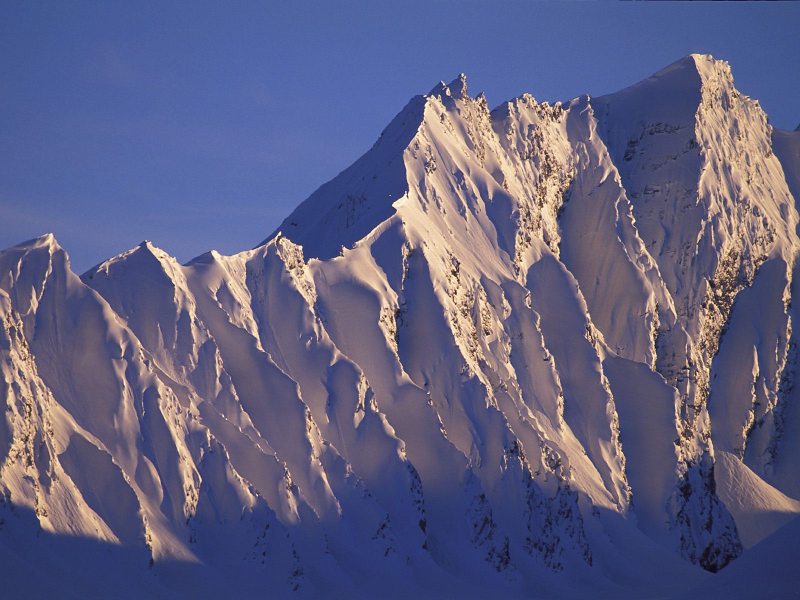 Alpenglow on Peak Chugach Mountains, Alaska.jpg